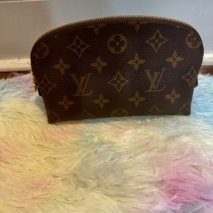 Louis Vuitton Pouch.